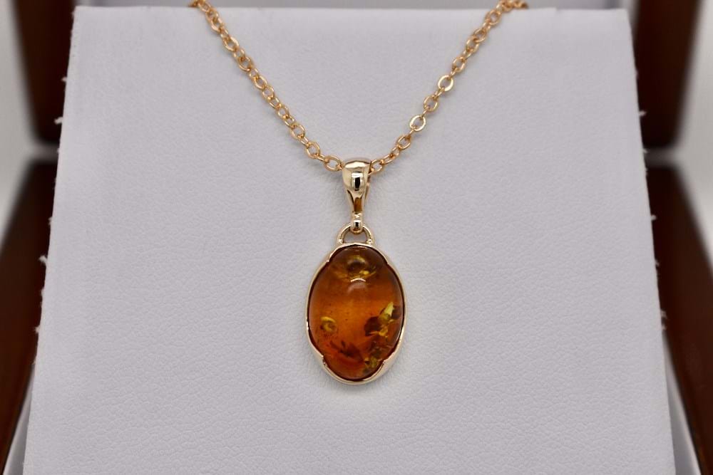 SOLD 9ct Yellow Gold Oval Amber Pendant
